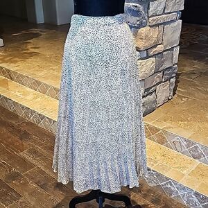Animal print pull on lined pleated skirt size small